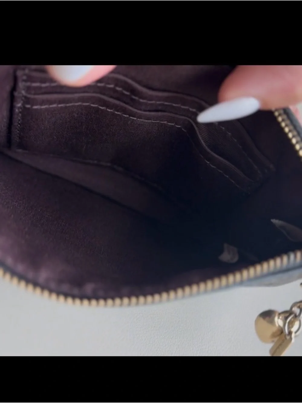 Coach Black Embossed Signature Wristlet with Gold Logo